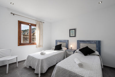 Schlafzimmer des Stadthauses Sa Pedra bei Pollença, Mallorca